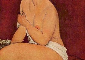 إمرأة عارية تجلس على أريكة إمرأة عارية تجلس على أريكة